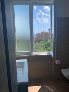 Phòng tắm tại TERRAZZA SUL MARE IN VIA DEVOTO