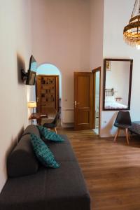 A bed or beds in a room at Relais CuoreNapoletano