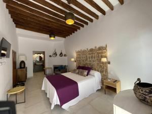 Katil atau katil-katil dalam bilik di Mdina Casa Rural