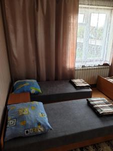 Postel nebo postele na pokoji v ubytování Kwatera27