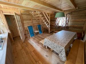 Postel nebo postele na pokoji v ubytování Domy Trapera