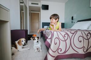 Domácí mazlíčci ubytovaní s hosty v ubytování Hotel Gloria