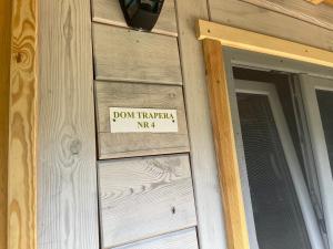 Certifikát, hodnocení, plakát nebo jiný dokument vystavený v ubytování Domy Trapera
