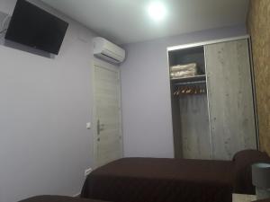 TV a/nebo společenská místnost v ubytování Pensión Matarraña + 27 fotografií