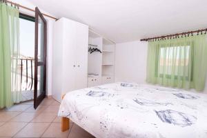 Posteľ alebo postele v izbe v ubytovaní Apartment in Kukljica - Insel Ugljan 39720