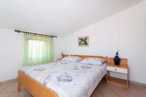 Posteľ alebo postele v izbe v ubytovaní Apartment in Kukljica - Insel Ugljan 39720