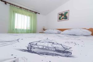 Posteľ alebo postele v izbe v ubytovaní Apartment in Kukljica - Insel Ugljan 39720