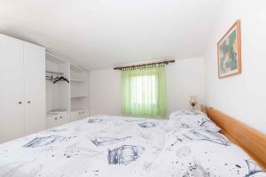 Posteľ alebo postele v izbe v ubytovaní Apartment in Kukljica - Insel Ugljan 39720