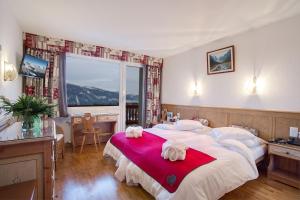Letto o letti in una camera di Hotel Ad'Eldorado