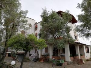 an exterior view of a house with trees at Verde & Mare in Palmi
