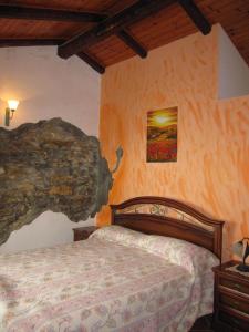 Postel nebo postele na pokoji v ubytování Agriturismo La Casa Vecchia