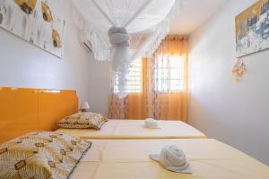 Postel nebo postele na pokoji v ubytování VILLA DALHIA + 28 fotografií