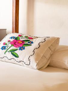 Ein Bett oder Betten in einem Zimmer der Unterkunft Hotel Boutique Casa Hipil