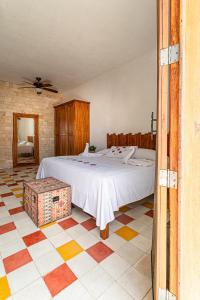 Ein Bett oder Betten in einem Zimmer der Unterkunft Hotel Boutique Casa Hipil