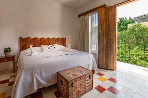 Postel nebo postele na pokoji v ubytování Hotel Boutique Casa Hipil