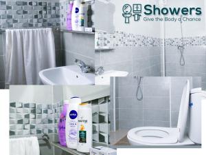 a bathroom with a white toilet and a sink at Ayouz House Hotel in Dakhla +18 photos