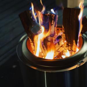 a fire in a stove with flames in it at TOCORO. Mt.Fuji CAMP&GLAMPING in Fujikawaguchiko