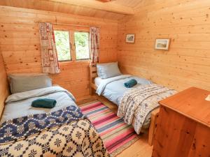 Postel nebo postele na pokoji v ubytování The Beach Shack + 12 fotografií