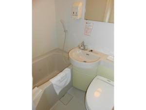 a bathroom with a toilet and a sink at R&B Hotel Umeda East - Vacation STAY 15379v in Osaka