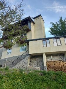 a building on top of a hill at Spardishi tower in Mestia