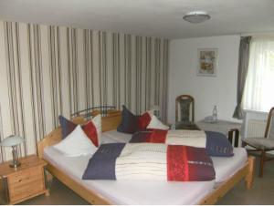 Postel nebo postele na pokoji v ubytování Pension Haus Butz