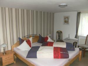 Postel nebo postele na pokoji v ubytování Pension Haus Butz