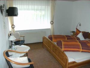 Postel nebo postele na pokoji v ubytování Pension Haus Butz