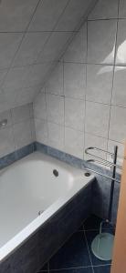 Kúpeľňa v ubytovaní NAPKŐ APARTMAN