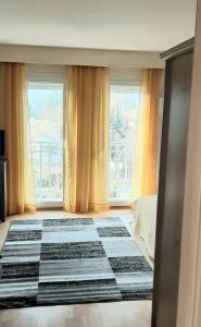 Posteľ alebo postele v izbe v ubytovaní NAPKŐ APARTMAN