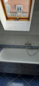 Kúpeľňa v ubytovaní NAPKŐ APARTMAN