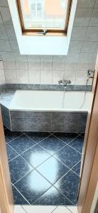 Kúpeľňa v ubytovaní NAPKŐ APARTMAN