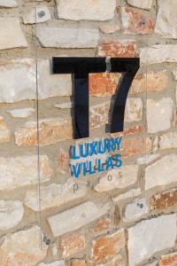 Certifikát, ocenenie alebo iný dokument vystavený v ubytovaní T7 LUXURY VILLAS PAROS