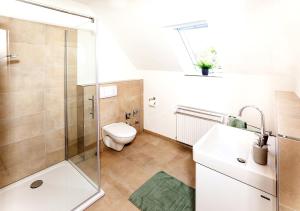 Koupelna v ubytování Gästehaus Sam + 5 fotografií