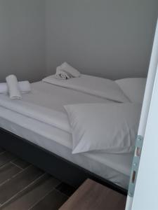 Postel nebo postele na pokoji v ubytování Sea&City View Luxury Apartment + 15 fotografií