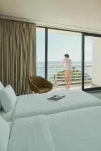Voodi või voodid majutusasutuse Bluesun hotel Berulia toas