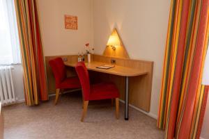 TV a/nebo společenská místnost v ubytování Haus Sonneck