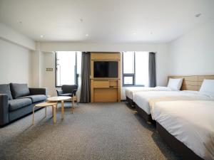 Krevet ili kreveti u jedinici u okviru objekta Henn na Hotel Seoul Myeongdong