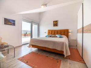 Posteľ alebo postele v izbe v ubytovaní Berat Apartment