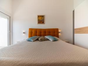 Posteľ alebo postele v izbe v ubytovaní Berat Apartment