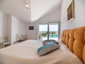 Posteľ alebo postele v izbe v ubytovaní Berat Apartment + 37 fotografií