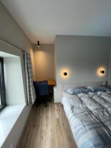 Letto o letti in una camera di Ver'Olive