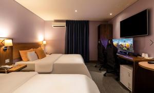 TV a/nebo společenská místnost v ubytování Incheon Soma Hotel