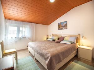Posteľ alebo postele v izbe v ubytovaní Berat Apartment