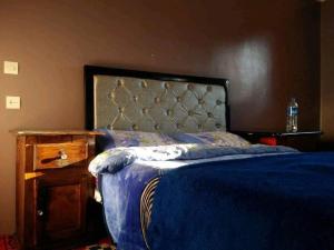 Letto o letti in una camera di Gite Dar Tanzoughte
