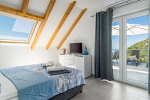 Posteľ alebo postele v izbe v ubytovaní Villa Panorama