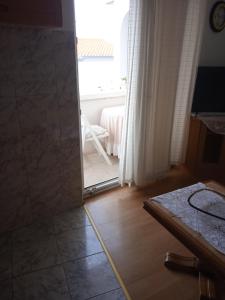 Postel nebo postele na pokoji v ubytování Apartments Suco