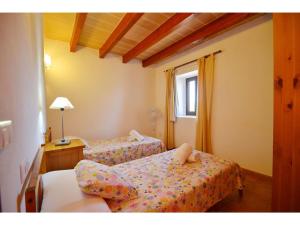 Łóżko lub łóżka w pokoju w obiekcie Mansion Mallorca with Private Pool
