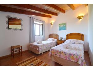 Łóżko lub łóżka w pokoju w obiekcie Mansion Mallorca with Private Pool
