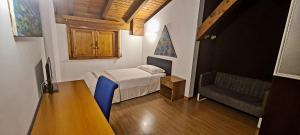 Postel nebo postele na pokoji v ubytování Hotel New Genziana