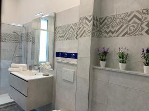 Et badeværelse på House Acciuga innamorata by holiday world + 14 billeder